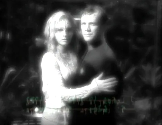 A black-and-white image of Lieutenant Paris and a woman embracing