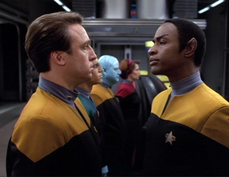 Tuvok inspecting a line of four other officers