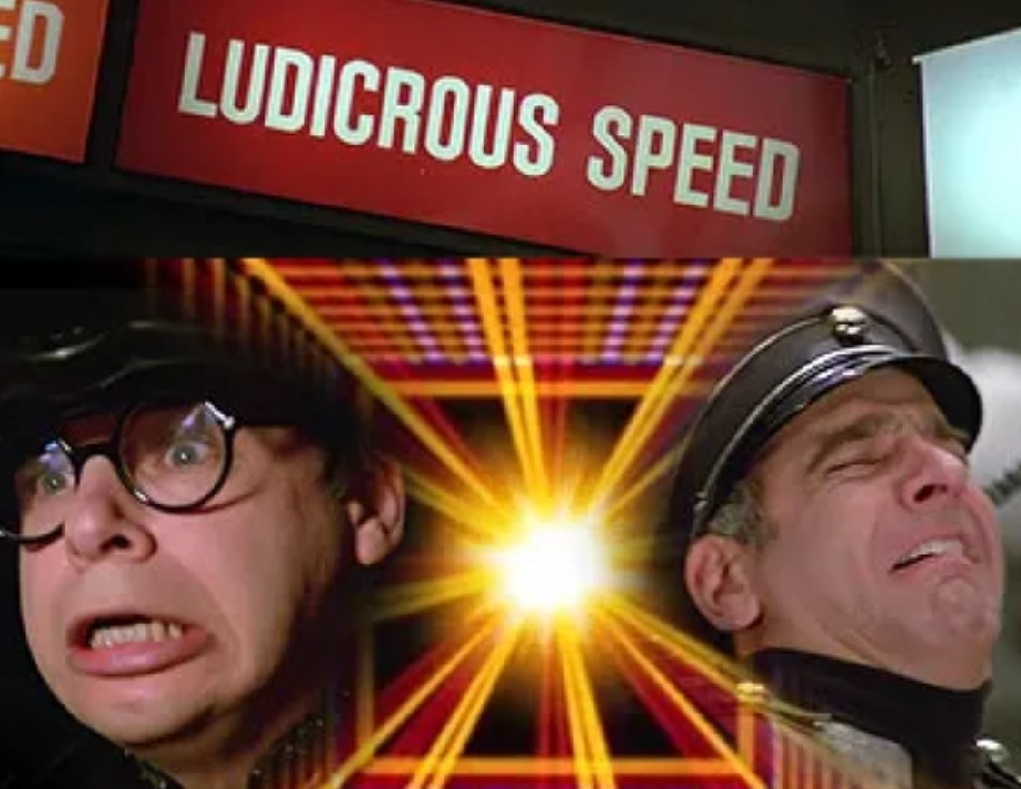 A sign that says 'Ludicrous Speed', a burst of light with a plaid design, Rick Moranis and George Wyner looking pained