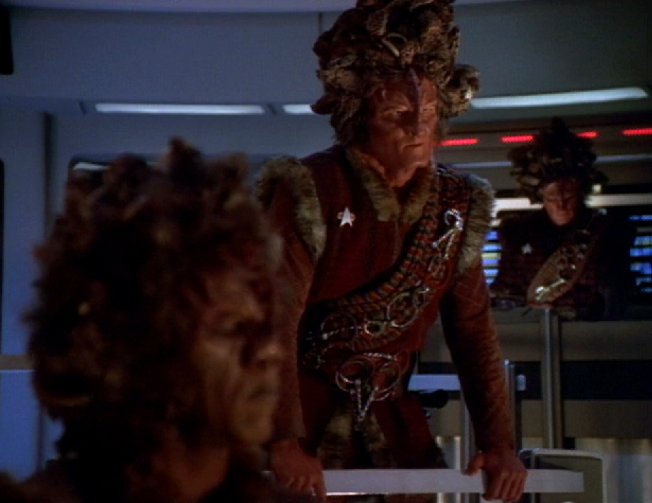 Several Kazon on the Voyager bridge wearing stolen Starfleet combadges