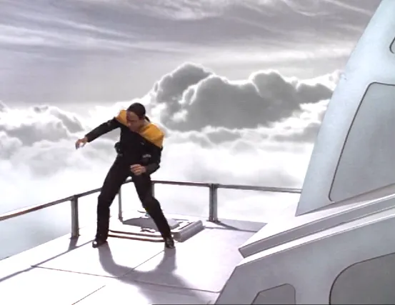 Tuvok struggling to keep his balance on the roof of a space elevator