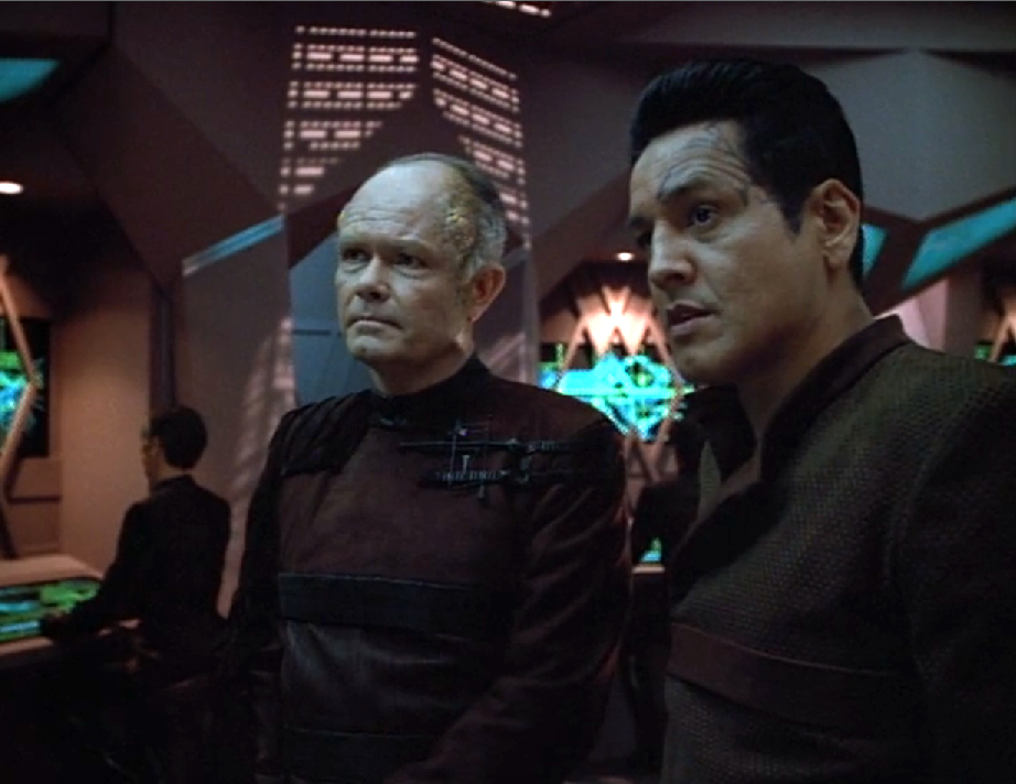 Chakotay speaking with Annorax, the man in charge of the weapon ship