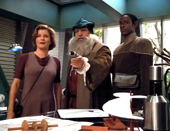 Janway and Tuvok observing Leonardo da Vinci demonstrating the use of a phaser