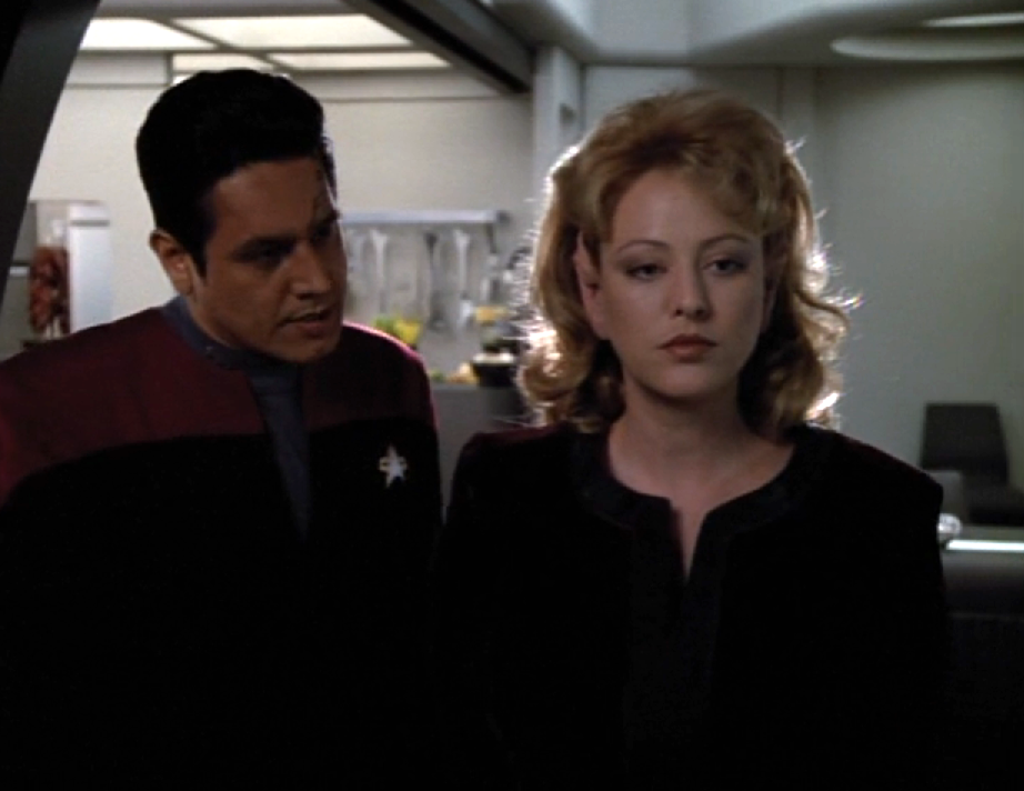 Chakotay having a conversation with Kellin in the mess hall