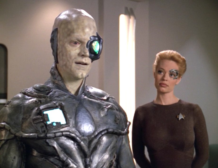 Seven of Nine observing an advanced-looking Borg drone