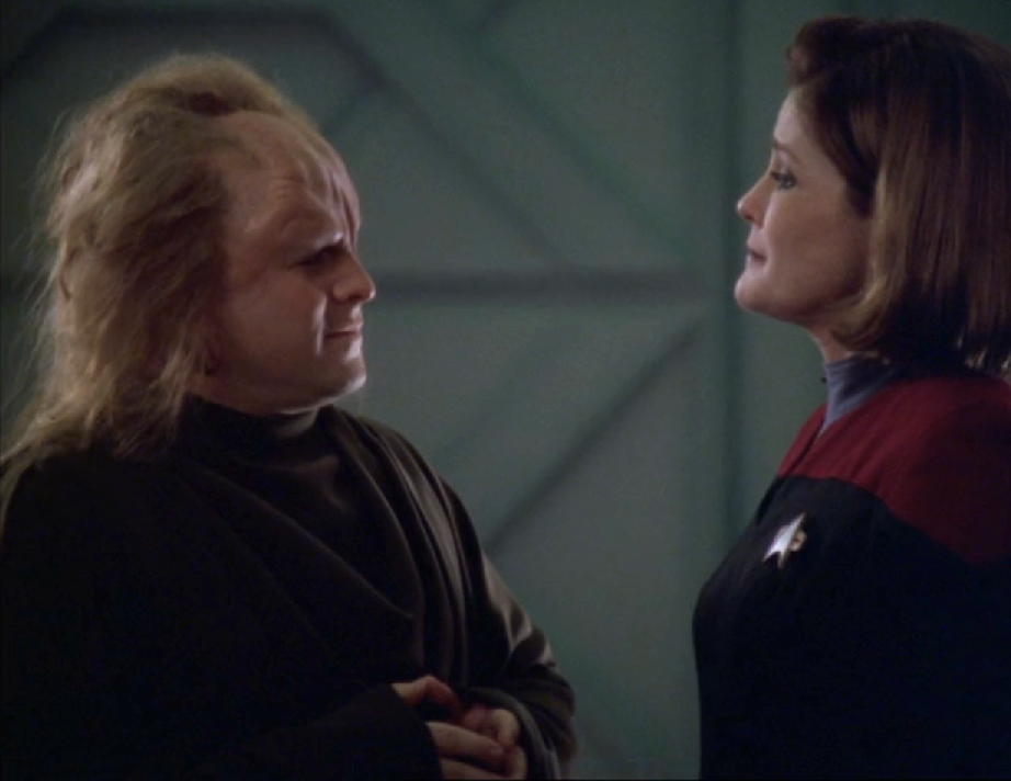 Janeway having a conversation with a representative of the Think Tank