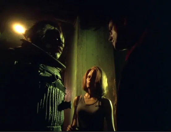 Chakotay and Torres talking to a Malon captain on his ship