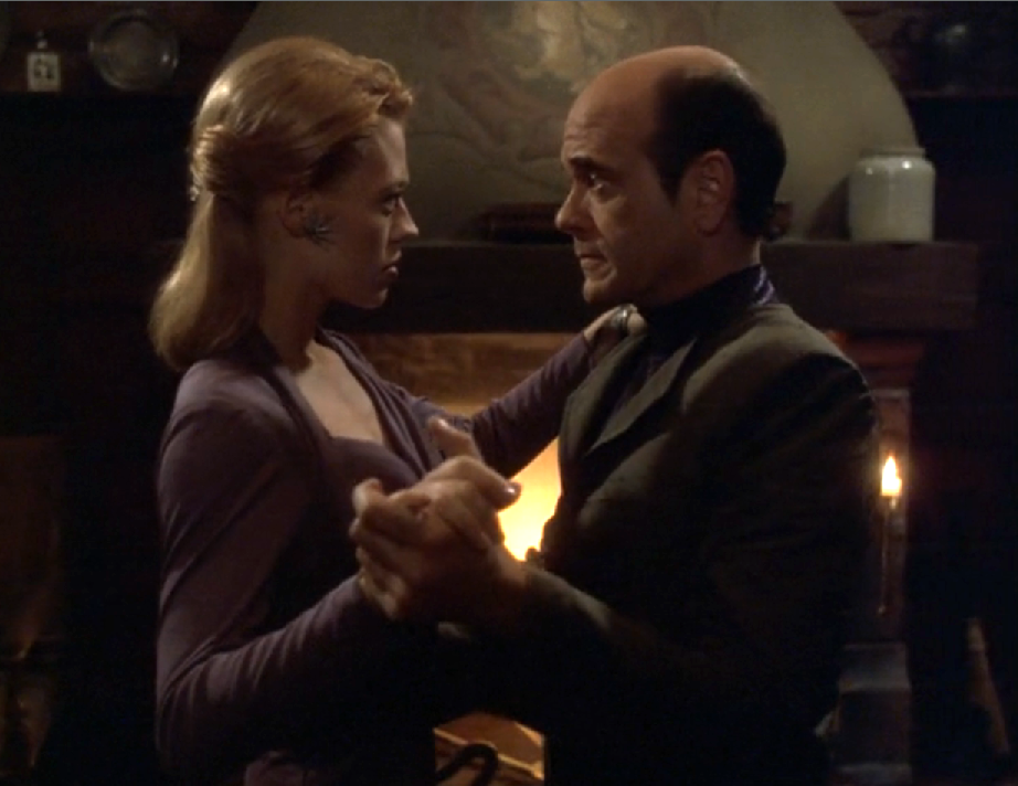 Seven and the Doctor, in evening attire, dancing