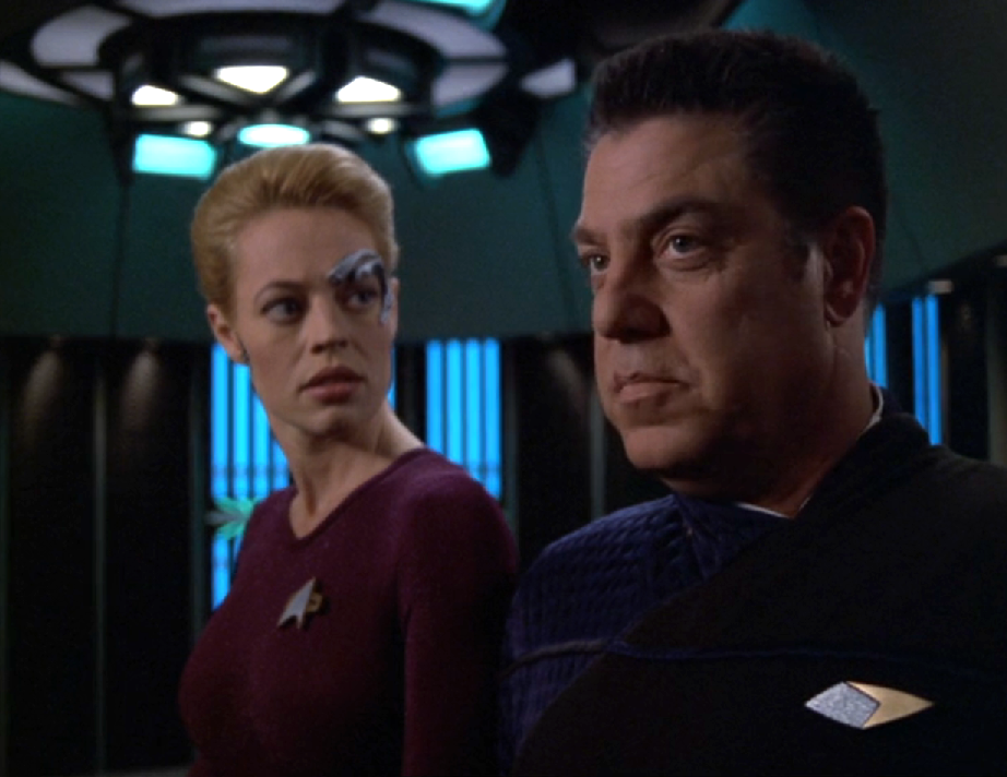 Seven of Nine and Captain Braxton preparing for a mission