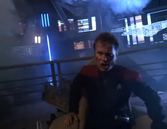Captain Ransom shouting orders on a heavily-damaged bridge
