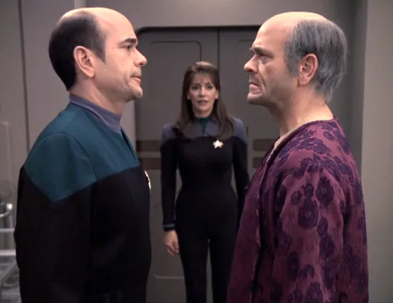 Deanna Troi trying to determine which of the similar-looking Doctor and Lewis Zimmerman is which