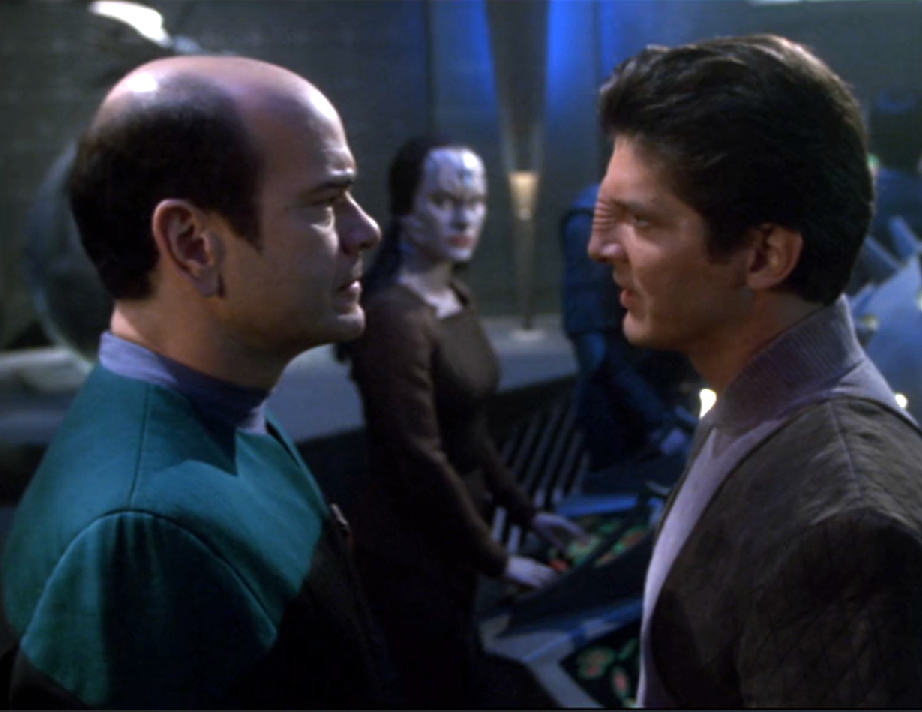 The Doctor speaking with Iden, the holographic Bajoran leader of the liberated holograms